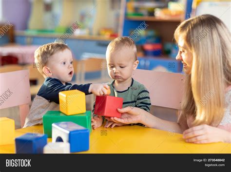 Cute Babies Play Image And Photo Free Trial Bigstock