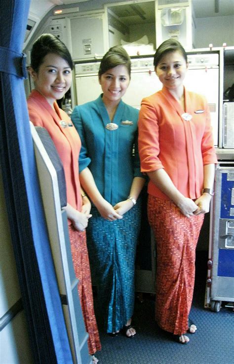 Garuda Indonesia Flight Attendants In Their Elegant New Uniform 2010 Featuring Kebaya And