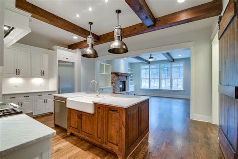 Adding exposed beams to your ceilings can be a fantastic way to bring style back to your rooms. Carbine & Associates Home Builders