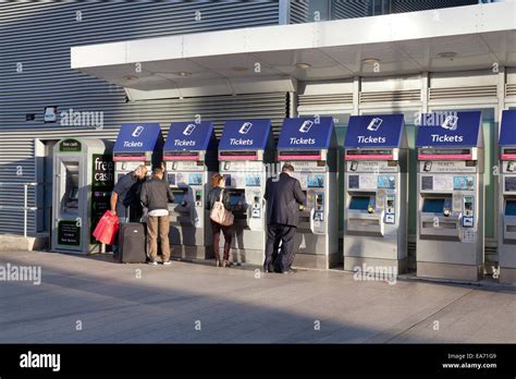 People Using Ticket Machines At London Bridge Station Stock Photo Alamy