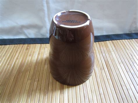 A Starbucks Brown Aida Coffee Tea Cup No Handle 8oz 2008 Ceramic Mug