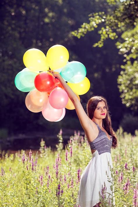 Girl Holding Balloons In Hand Stock Image Image Of Person Green