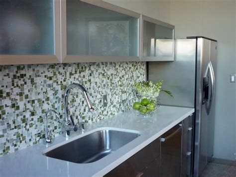 Modern White Kitchen With Mosaic Stone Backsplash Hgtv