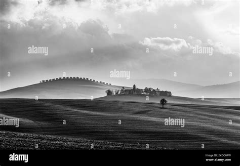 A Monochrome Shot Of Sunlight Over The Val Dorcia Valley In Tuscany