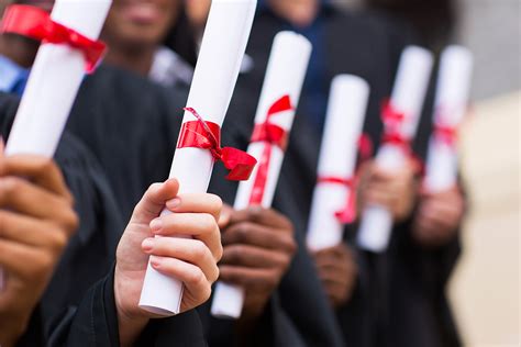 Group Of Graduates Holding Diploma Red River Mutual