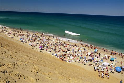 Sunbathers At Newcomb Hollow Beach Photograph By Michael Melford