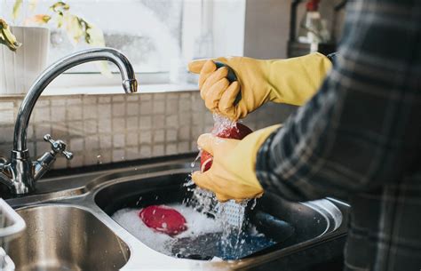 The Weird Reason Handwashing Your Dishes Can Make You A Happier Person