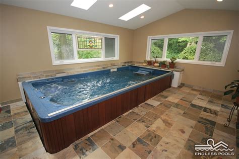 An Indoor Endless Pools Swim Spa Provides Swimming And Therapy Without Leaving Your Home