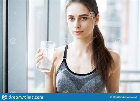 Smiling Pretty Woman Holds A Glass Of Water Leaning Stock Photo Image