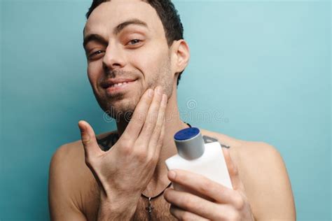Shirtless White Man Smiling At Camera While Posing With Towel Stock