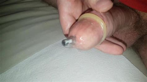 Urethral Sounding A Rod While Wearing A Condom Sounding Cumshot Inside A Condom With Cockring