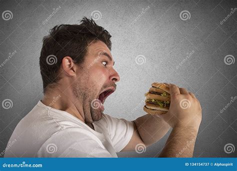 Insatiable And Hungry Man Eating A Sandwich Stock Image Image Of