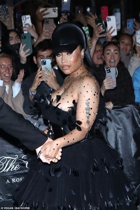 my boobs are popping out nicki minaj almost spills out of her very busty dress as she