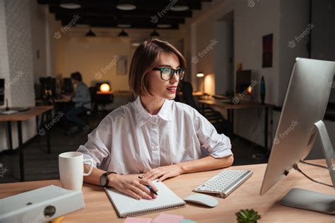 Premium Photo Happy Pretty Young Businesswoman In Glasses Writing And