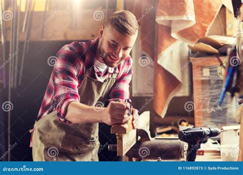 Carpenter Working With Plane And Wood At Workshop Stock Image Image
