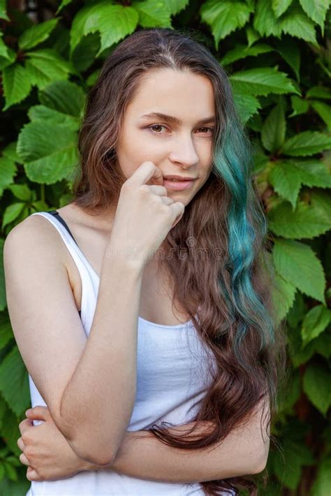 Beautiful Young Hipster Brunete Girl With Long Green Hair Smiling On