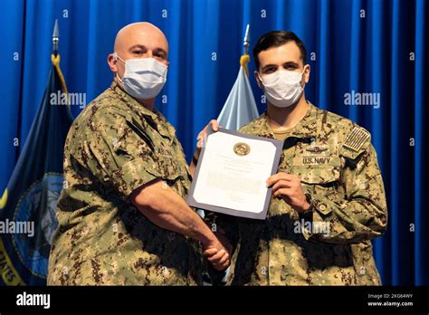 Hospital Corpsman 2nd Class Kevin Garland Receives A Letter Of