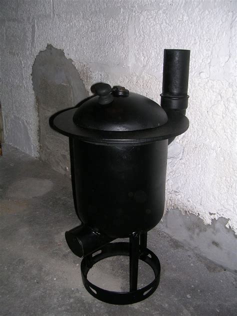 Materials needed for this diy wood stove include scraped butane tank, long box section for the legs, weld mesh, fire cement, scrap, pipe, plate steel for the hot plates, and many other tools like a welder, angle grinder, etc.,! 12 Homemade Wood Burning Stoves and Heaters Plans and Ideas:Do It Yourself - The Self-Sufficient ...