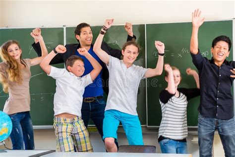 Teacher Motivating Students In School Class Stock Photo Image Of