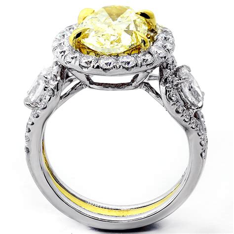 Before you can figure out where you should buy your engagement. 4.73 Cts Fansy Yellow Oval cut Engagement Ring set in 18K ...