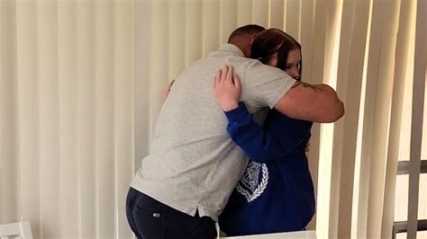 beloved stepdad fights back tears when he s surprised with heartfelt note and adoption papers by