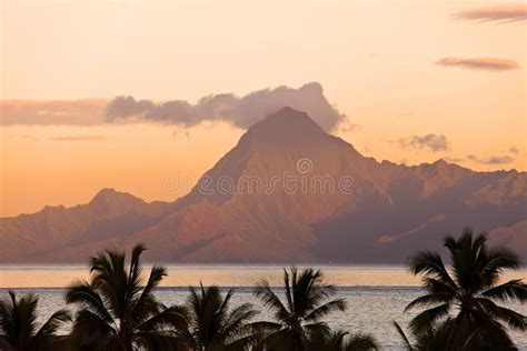 A Sunset Over Ocean And Mountain Polynesia Tahiti With A Retro