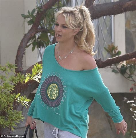 Britney Spears Flaunts Her Toned Physique In An Off Shoulder Sweater