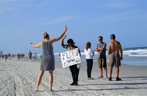 florida s beaches flooded with people the minute they reopen after donald trump fuels demos