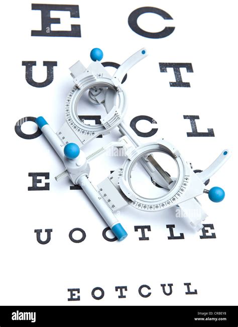 Optometry Concept Sight Measuring Spectacles And Eye Chart Stock Photo