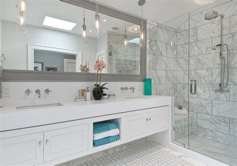 Because stone can be polished to a glimmer, using carrara bathroom tiles on the walls reflects light off making the entire room look illuminated and fresh. 27 Elegant Carrara Marble Tile Ideas & Marble Tile Types ...