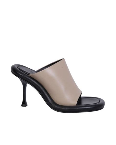 Jw Anderson Bumper Tube Padded Mules In Brown Lyst