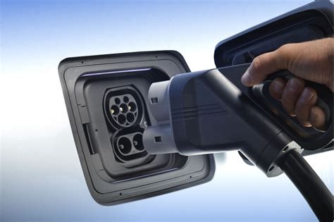 My i3's charging port lock jammed. BMW's New Electric Car Charger Lays Ground For Charging Network. So, Why All That Talk With Tesla?
