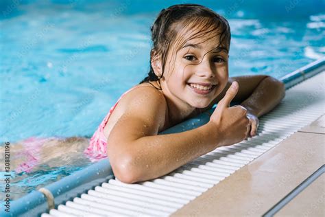 Portrait Little Girl Having Fun In Indoor Swimming Pool The Girl Is