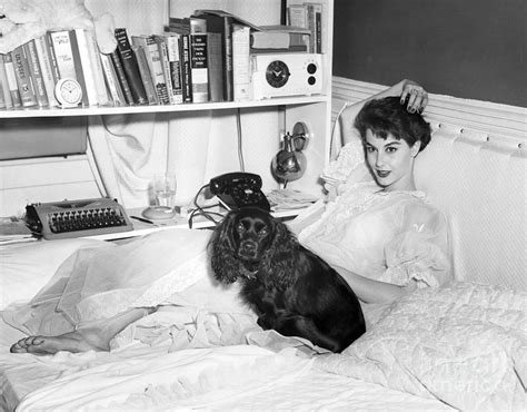 Nancy Berg Plays With Precious Puppy In Her Bed 1955 Photograph By