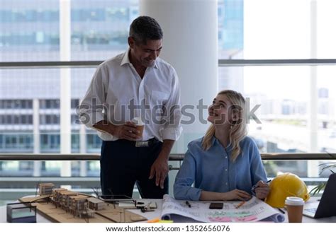 Front View Happy Caucasians Architects Interacting Stock Photo