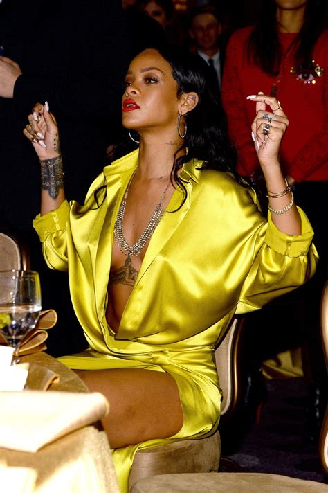 Rihanna Wore A Yellow Frock With A Plunging Neckline Miley Taylor
