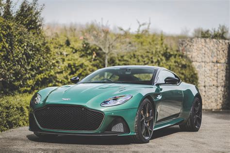 The ultimate production aston martin, available in both coupe and volante, offering the ultimate super gt experience. Aston Martin DBS 59 is Green and Bronze Beauty
