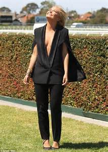 Lara Bingle Wears Dramatically Low Cut Cape At Caulfield Cup Races In