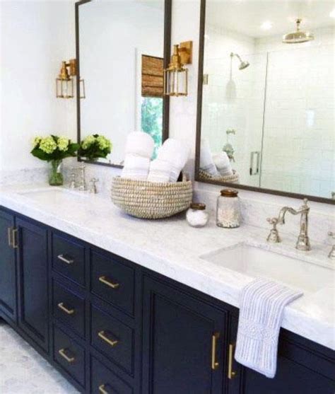 Inspired by classic elements, this bathroom vanity in navy blue has been upgraded to suit the needs of the modern home. Top 50 Best Blue Bathroom Ideas - Navy Themed Interior Designs
