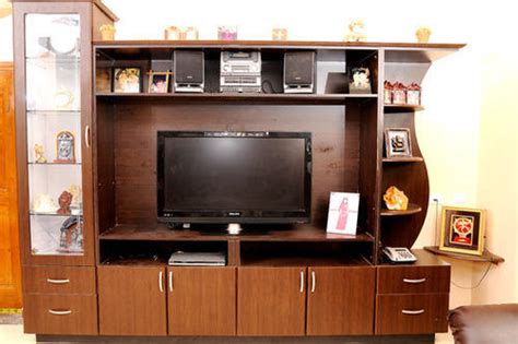 Looking for the perfect showcase design for hall? T V Showcase - Wooden TV Showcase Architect / Interior ...