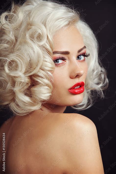 Vintage Style Portrait Of Young Beautiful Sexy Blonde Pin Up Girl With