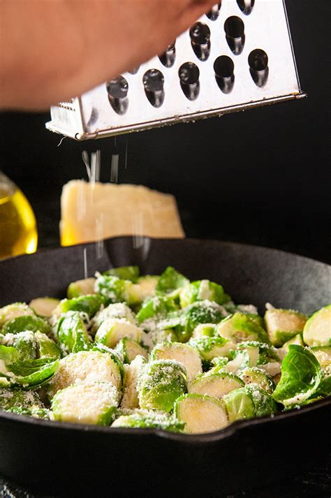 This fabulous lightly seasoned crispy parmesan roasted potatoes and brussels sprouts combines both red and purple potatoes with brussels sprouts and parmesan. Roasted Garlic Parmesan Brussel Sprouts - Seasoned Sprinkles