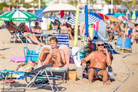British Tourists Brave Cerberus Heatwave To Pack Benidorm Beaches Express Digest Express Digest