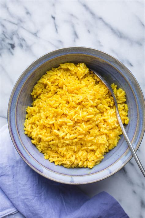 Add rice, broth, tumeric, and salt. Yellow Rice - Taste Love and Nourish