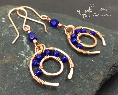 Handmade Copper Earrings Dangling Wagon Wheels Wire Wrapped Blue Glass