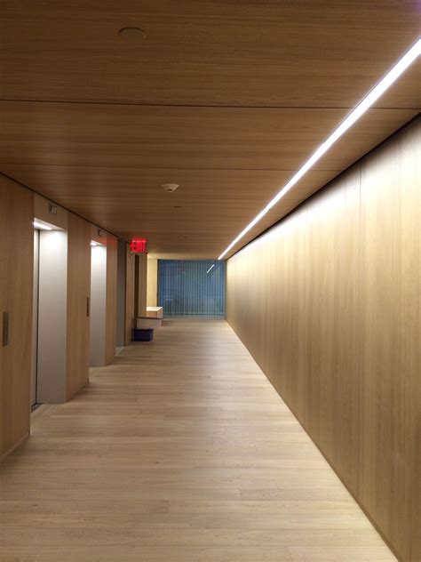 Shinnoki Ivory Oak Walls Matching Plain Sawn White American Oak Oak Panels Corridor Design