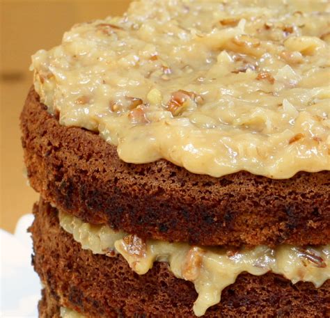 The best homemade german chocolate cake with layers of coconut pecan frosting and chocolate frosting. Made From Scratch German Chocolate Cake | Wives with Knives