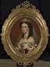 a portrait of a woman wearing a tiara