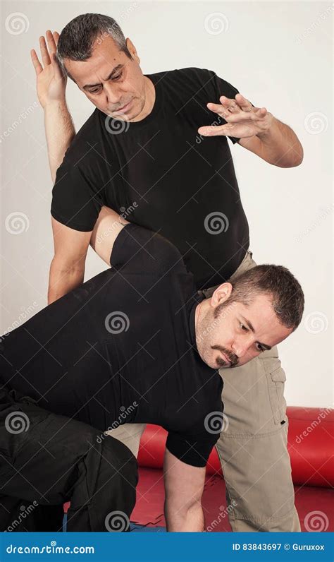 Kapap Instructor Demonstrates Standing Arm Lock Techniques Stock Image