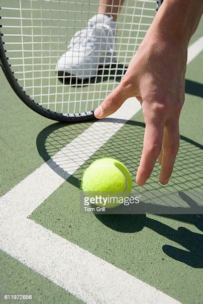 Woman Hand Holding Tennis Ball Photos And Premium High Res Pictures